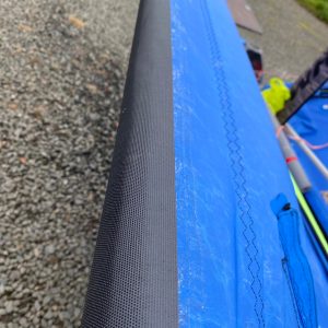Image of protector tape along the edge of a WASZP tramp, product close up